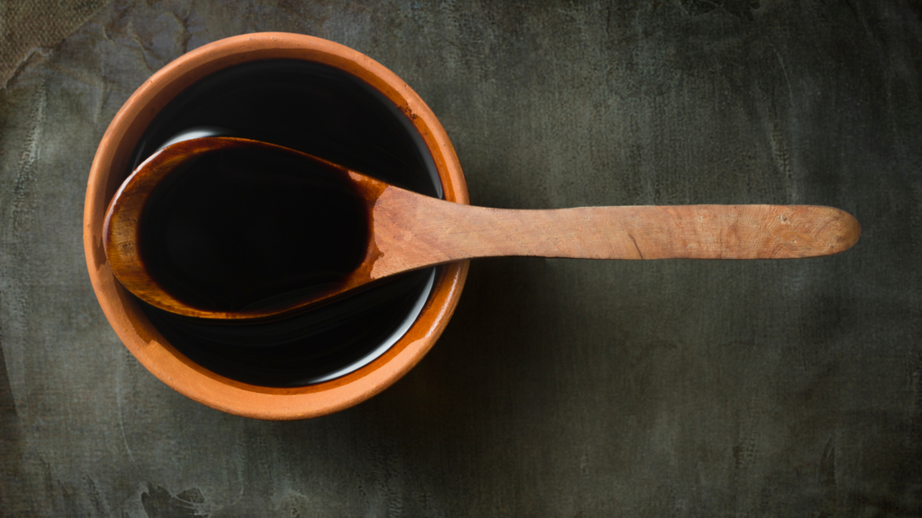 Bowl and spoon with coconut aminos